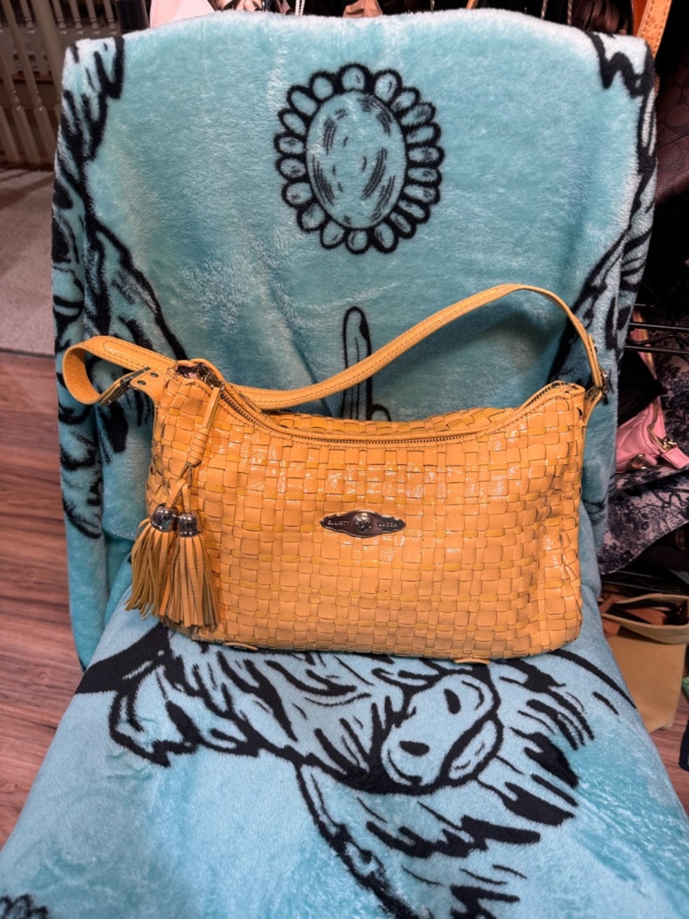 Well worn Elliott Lucca Yellow Woven Leather Shoulder Bag with Tassel